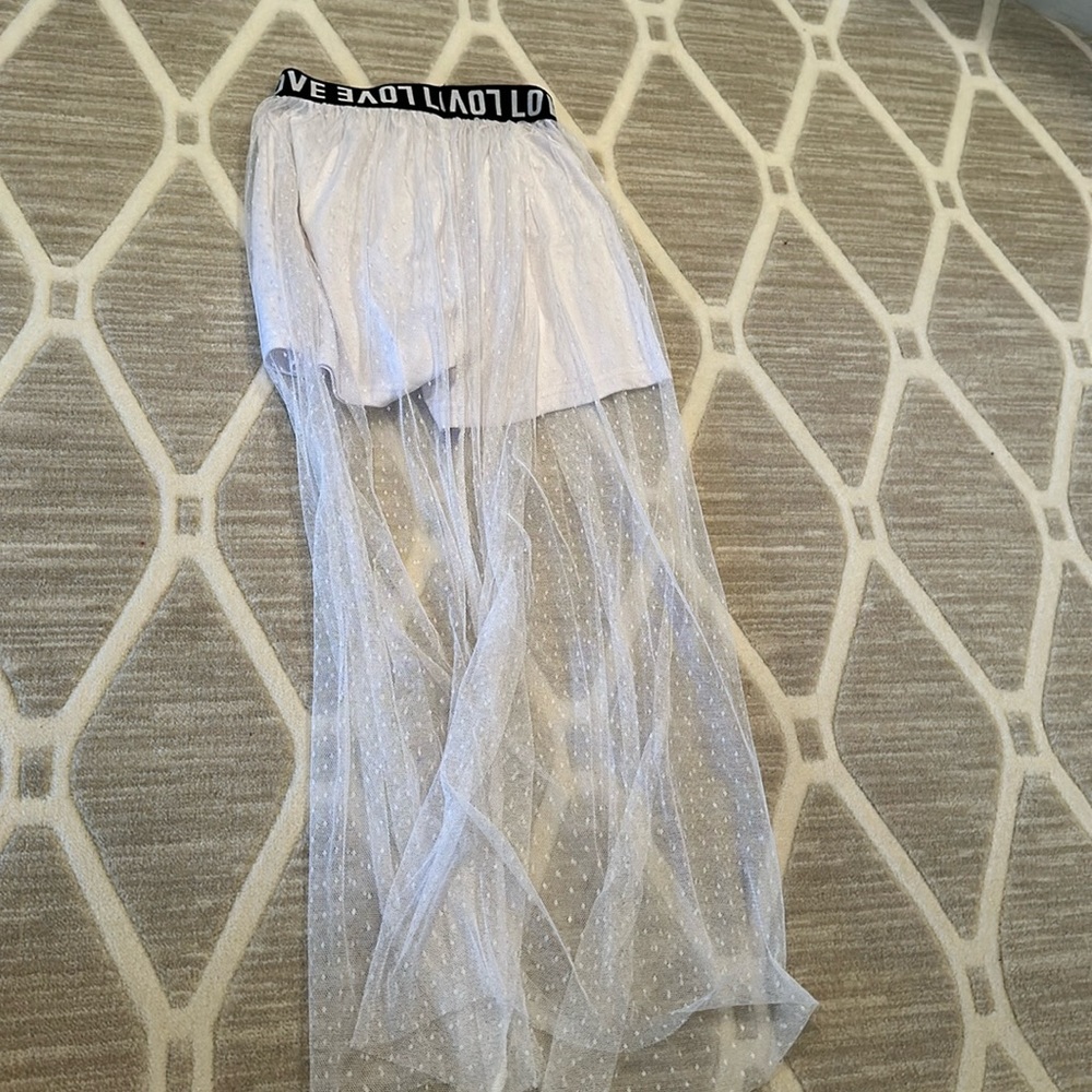 This is a pair of shorts with a lace covering over top. It is great for summer